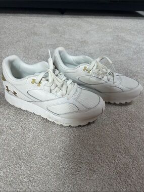 Under Armour Women's White Sneakers with Gold Logo Accents